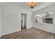 Dining room featuring hardwood floors and built-in shelving at 1410 Yates St, Orlando, FL 32804