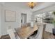 Bright dining room with wood table and built-in shelving at 1410 Yates St, Orlando, FL 32804