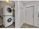 Laundry room with stacked washer and dryer at 1410 Yates St, Orlando, FL 32804