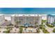 Oceanfront building with parking and tropical landscaping at 4631 S Atlantic Ave # 8301, Ponce Inlet, FL 32127