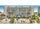 Oceanfront building showcasing a balcony on the third floor at 4631 S Atlantic Ave # 8301, Ponce Inlet, FL 32127