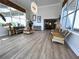 Light and bright lobby area with floor-to-ceiling windows, comfortable seating, and elegant decor at 4631 S Atlantic Ave # 8301, Ponce Inlet, FL 32127