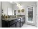 Double vanity bathroom with granite countertop and private access at 5431 Solterra Cir, Davenport, FL 33837
