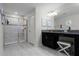 Large bathroom with a walk-in shower and granite countertops at 5431 Solterra Cir, Davenport, FL 33837