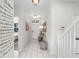 Bright entryway with console table and wall art at 5431 Solterra Cir, Davenport, FL 33837