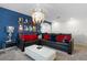 Star Wars themed game room with sectional sofa and media center at 5431 Solterra Cir, Davenport, FL 33837