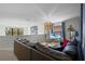 Spacious game room with a sectional sofa and Star Wars decor at 5431 Solterra Cir, Davenport, FL 33837