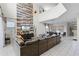 Bright living area featuring a sectional sofa and a statement wall at 5431 Solterra Cir, Davenport, FL 33837
