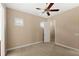 Neutral bedroom featuring carpet and ceiling fan at 290 Silver Maple Rd, Groveland, FL 34736