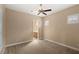 Neutral bedroom featuring carpet and a ceiling fan at 290 Silver Maple Rd, Groveland, FL 34736