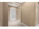 Bright entryway features neutral walls and tiled flooring leading into the home at 290 Silver Maple Rd, Groveland, FL 34736