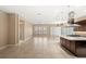 Open floor plan featuring living room flowing into the kitchen with an island at 290 Silver Maple Rd, Groveland, FL 34736