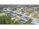 Aerial view of neighborhood with houses and pools at 4905 Pall Mall E St, Kissimmee, FL 34758