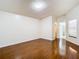 Bright bedroom with hardwood floors and access to bathroom at 2906 Woodruff Dr, Orlando, FL 32837
