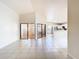 Bright and airy living room with tile floors and sliding glass doors at 2906 Woodruff Dr, Orlando, FL 32837