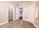 Bathroom with grey wood-look tile floors and a toilet at 790 Candlebrush Ln, Lake Mary, FL 32746