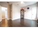 Bedroom with dark hardwood floors and built-in shelving at 790 Candlebrush Ln, Lake Mary, FL 32746