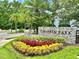 Griffin Park entrance with landscaping and stonework at 790 Candlebrush Ln, Lake Mary, FL 32746