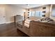 Living room with dark hardwood floors and comfy sectional sofa at 790 Candlebrush Ln, Lake Mary, FL 32746