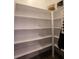 Bright walk-in pantry with ample shelving at 790 Candlebrush Ln, Lake Mary, FL 32746