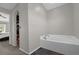 Relax and unwind in this soaking tub in the primary bathroom at 132 Spanish Bay Dr, Sanford, FL 32771