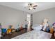 Playroom featuring a rainbow shag rug and filled with toys and stuffed animals at 132 Spanish Bay Dr, Sanford, FL 32771