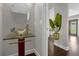 Stylish powder room featuring a unique glass vessel sink and modern fixtures at 132 Spanish Bay Dr, Sanford, FL 32771