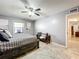 Comfortable bedroom with a king-size bed and built-in drawers at 100 E Oak Terrace Dr # G1, Leesburg, FL 34748