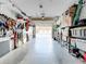 Spacious garage with ample storage shelving and room for two cars at 100 E Oak Terrace Dr # G1, Leesburg, FL 34748