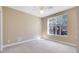 Bright bedroom with a large window offering natural light and a pleasant view at 913 Lotus Vista Dr # 101, Altamonte Springs, FL 32714