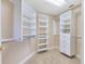 Organized walk-in closet with built-in shelving and ample storage space at 913 Lotus Vista Dr # 101, Altamonte Springs, FL 32714