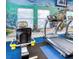 Modern fitness center with treadmills and rowing machines at 113 Rogues Retreat, Davenport, FL 33897