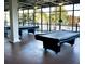 Community game room with two pool tables at 113 Rogues Retreat, Davenport, FL 33897