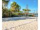 Beach volleyball court near the lake at 113 Rogues Retreat, Davenport, FL 33897