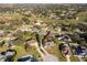 Wide aerial view of home and surrounding neighborhood at 13707 Calle De Ora Ct, Clermont, FL 34711