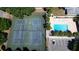 Aerial view of the community pool, tennis courts and parking at 2722 Graduate Ct, Orlando, FL 32826