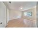Bedroom with large window, light wall, and neutral vinyl floor at 2722 Graduate Ct, Orlando, FL 32826