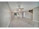 Bright, spacious living room featuring tile flooring and a ceiling fan at 2722 Graduate Ct, Orlando, FL 32826