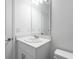 Well-lit bathroom showcasing a white vanity and modern fixtures at 349 River Front Way, Edgewater, FL 32141