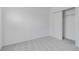 A bright bedroom with neutral carpet and closet space at 349 River Front Way, Edgewater, FL 32141