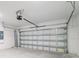 Spacious garage featuring an automatic door system at 349 River Front Way, Edgewater, FL 32141