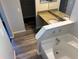 Relaxing bathroom with soaking tub, granite countertop vanity, and step-in shower at 806 Grantham Dr, Kissimmee, FL 34758