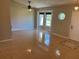 Open living room with tiled flooring, natural light, ceiling fan and neutral paint at 806 Grantham Dr, Kissimmee, FL 34758