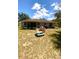 Large backyard with picnic table and playset at 4490 Treasure Cay Rd, Tavares, FL 32778