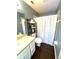 Clean bathroom with shower/tub and updated vanity at 4490 Treasure Cay Rd, Tavares, FL 32778