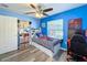 bedroom with twin bed, gaming chair, and Spiderman decor at 4490 Treasure Cay Rd, Tavares, FL 32778