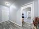 Bright entryway with gray walls and wood-look flooring at 4490 Treasure Cay Rd, Tavares, FL 32778