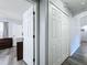 Bright hallway with two closets and access to bedrooms at 4490 Treasure Cay Rd, Tavares, FL 32778