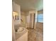 Well-lit bathroom with a walk-in shower, sink, and closet space at 4901 Pleasant Hollow Trl, Lakeland, FL 33811
