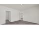 Simple bedroom with carpet and access to bathroom at 957 King Parc Rd, Orange City, FL 32763